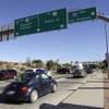 Photo: Motorists roll through a traffic light on southbou Photo: Motorists roll through a traffic light on southbou