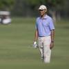 Photo: President Barack Obama looks to the second green a Photo: President Barack Obama looks to the second green a