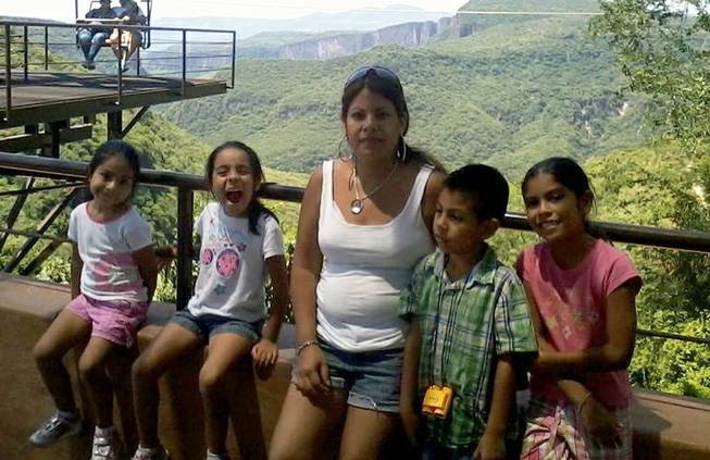 Sandra Ramos poses with her four children in an undated photo. Ramos plans to cross the border from Tijuana to San Diego on March 13, 2014, as part of the "Bring Them Home" event in which more than 30 immigrants without approval will cross into the United States seeking residency or asylum. Three of Ramos' four children are U.S. citizens.