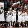 New Mexico's Kendall Williams, center, waves a towel to cheer on his teammates during the first half of an NCAA college basketball game against New Mexico in the quarterfinals of the Mountain West Conference tournament, Thursday, March 13, 2014, in Las Vegas. (AP Photo/Isaac Brekken) New Mexico's Kendall Williams, center, waves a towel to cheer on his teammates during the first half of an NCAA college basketball game against New Mexico in the quarterfinals of the Mountain West Conference tournament, Thursday, March 13, 2014, in Las Vegas. (AP Photo/Isaac Brekken)