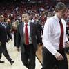 UNLV associate head coach Heath Schroyer, San Diego State assistant coach Justin Hutson and UNLV head coach Dave Rice exit the court after the #8 ranked Aztecs beat the Rebels 59-51 in their Mountain West Conference semifinal game Friday, March 14, 2014. UNLV associate head coach Heath Schroyer, San Diego State assistant coach Justin Hutson and UNLV head coach Dave Rice exit the court after the #8 ranked Aztecs beat the Rebels 59-51 in their Mountain West Conference semifinal game Friday, March 14, 2014.