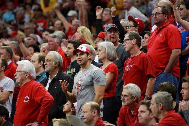 A UNLV fan acts dumbfounded when coach Dave Rice has his team stop playing with 15 seconds on the clock against San Diego State during their Mountain West Conference semifinal game Friday, March 14, 2014 at the Thomas & Mack Center. The #8 ranked San Diego State Aztecs won 59-51 to advance to the finals.