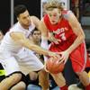 San Diego State forward J.J. O'brien fouls New Mexico guard Hugh Greenwood during their Mountain West Conference tournament championship game Saturday, March 15, 2014 at the Thomas & Mack Center. The Lobos won their third straight title, defeating the Lobos 64-58. San Diego State forward J.J. O'brien fouls New Mexico guard Hugh Greenwood during their Mountain West Conference tournament championship game Saturday, March 15, 2014 at the Thomas & Mack Center. The Lobos won their third straight title, defeating the Lobos 64-58.