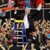 New Mexico head coach Craig Neal cuts down the net after the Lobos defeated San Diego State 64-58 in the Mountain West Conference tournament championship game Saturday, March 15, 2014 at the Thomas & Mack Center. New Mexico head coach Craig Neal cuts down the net after the Lobos defeated San Diego State 64-58 in the Mountain West Conference tournament championship game Saturday, March 15, 2014 at the Thomas & Mack Center.
