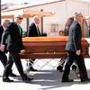 Pallbearers carry the casket of John Davis "Jackie" Gaughan into St. Viator Catholic Church for a memorial mass in Las Vegas on St. Patrick's Day, March 17, 2014. Pallbearers carry the casket of John Davis "Jackie" Gaughan into St. Viator Catholic Church for a memorial mass in Las Vegas on St. Patrick's Day, March 17, 2014.
