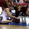 Kansas' Perry Ellis, left, and Eastern Kentucky's Corey Walden fight over a loose ball during the first half of a second-round game in the NCAA college basketball tournament Friday, March 21, 2014, in St. Louis. Kansas' Perry Ellis, left, and Eastern Kentucky's Corey Walden fight over a loose ball during the first half of a second-round game in the NCAA college basketball tournament Friday, March 21, 2014, in St. Louis.