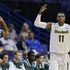 Wichita State forward Cleanthony Early (11) celebrates his three-point basket against Cal Poly during the first half of a second-round game in the NCAA college basketball tournament Friday, March 21, 2014, in St. Louis. Wichita State forward Cleanthony Early (11) celebrates his three-point basket against Cal Poly during the first half of a second-round game in the NCAA college basketball tournament Friday, March 21, 2014, in St. Louis.