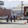 Photo: Metro detectives investigate the scene of a fatal Photo: Metro detectives investigate the scene of a fatal