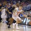 Florida guard Scottie Wilbekin (5) forces Pittsburgh forward Lamar Patterson (21) to turn over the ball as Pittsburgh guard Josh Newkirk (13) closes in during the second half in a third-round game in the NCAA college basketball tournament Saturday, March 22, 2014, in Orlando, Fla. Florida guard Scottie Wilbekin (5) forces Pittsburgh forward Lamar Patterson (21) to turn over the ball as Pittsburgh guard Josh Newkirk (13) closes in during the second half in a third-round game in the NCAA college basketball tournament Saturday, March 22, 2014, in Orlando, Fla.