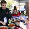 Photo: Chef Tim Walsh of Sonrisa Grill stirs up batch at Photo: Chef Tim Walsh of Sonrisa Grill stirs up batch at