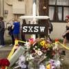 Photo: In this March 15, 2014, file photo, a cross and fl Photo: In this March 15, 2014, file photo, a cross and fl