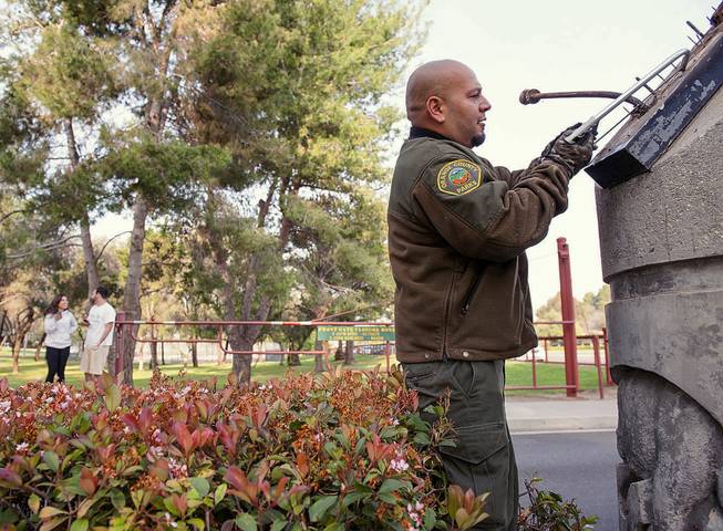 Orange County Parks grounds keeper Frank Amaro removes the supports to the sign at the entrance of Ralph B. Clark Regional Park in Buena Park in Fullerton, Calif., on Saturday, March 29, 2014, morning after rangers discovered it fell off it's supports after an earthquake hit Orange County Friday night. More than 100 aftershocks have rattled Orange County south of Los Angeles where a magnitude-5.1 earthquake struck Friday. Despite the relatively minor damage, no injuries have been reported. (AP Photo/The Orange County Register, Ken Steinhardt) MAGS OUT; LOS ANGELES TIMES OUT