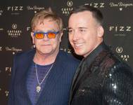 Sir Elton John and David Furnish attend the official grand opening of Fizz on Friday, March 28, 2014, at Caesars Palace. Sir Elton John and David Furnish attend the official grand opening of Fizz on Friday, March 28, 2014, at Caesars Palace.