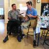 Amputee Eddie Garcia talks with Rudy Garcia-Tolson from the Challenged Athletes Foundation about the new prosthetics he will be receiving Wednesday, April 2, 2014. Amputee Eddie Garcia talks with Rudy Garcia-Tolson from the Challenged Athletes Foundation about the new prosthetics he will be receiving Wednesday, April 2, 2014.