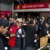 Photo: Guy Fieri squirts water in celebration while servi Photo: Guy Fieri squirts water in celebration while servi