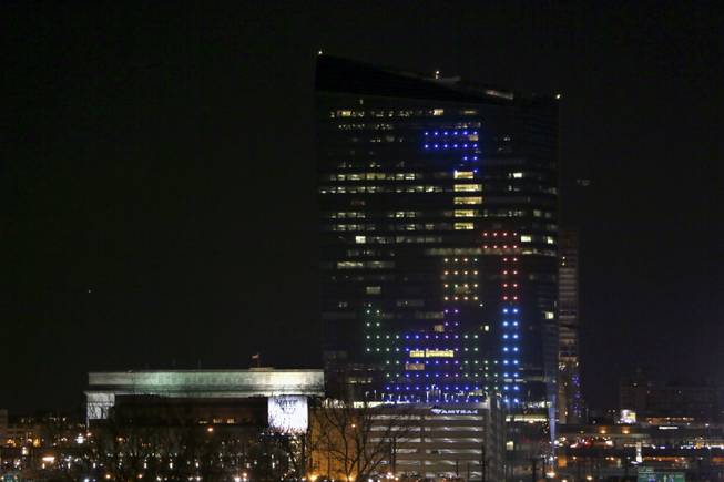 The classic video game Tetris is played on the 29-story Cira Centre in Philadelphia on Saturday, April 5, 2014, using hundreds of LED lights embedded in its glass facade. The spectacle kicks off a citywide series of events called Philly Tech Week and also celebrates the upcoming 30th anniversary of Tetris.