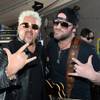 Guy Fieri and Lee Brice attend Day 2 of the 2014 ACM Party for a Cause at the Linq on Saturday, April 5, 2014, in Las Vegas. Guy Fieri and Lee Brice attend Day 2 of the 2014 ACM Party for a Cause at the Linq on Saturday, April 5, 2014, in Las Vegas.