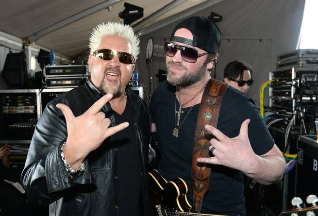 Guy Fieri and Lee Brice attend Day 2 of the 2014 ACM Party for a Cause at the Linq on Saturday, April 5, 2014, in Las Vegas.