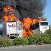 Photo: Massive flames are seen devouring both vehicles ju Photo: Massive flames are seen devouring both vehicles ju