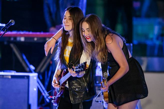 Haim performs at Boulevard Pool on Thursday, April 17, 2014, in the Cosmopolitan of Las Vegas.