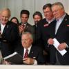 Photo: Georgia Gov. Nathan Deal, seated, signs House Bill Photo: Georgia Gov. Nathan Deal, seated, signs House Bill