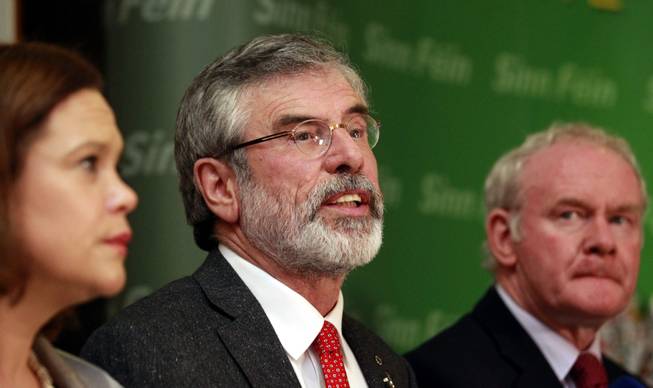 Sinn Fein party leader Gerry Adams speaks to the media in West Belfast, Northern Ireland, on Sunday, May 4, 2014. Adams was released without charge Sunday after five days of police questioning over his alleged involvement in a decades-old Irish Republican Army killing, an event that has driven a dangerous wedge into Northern Ireland's unity government.