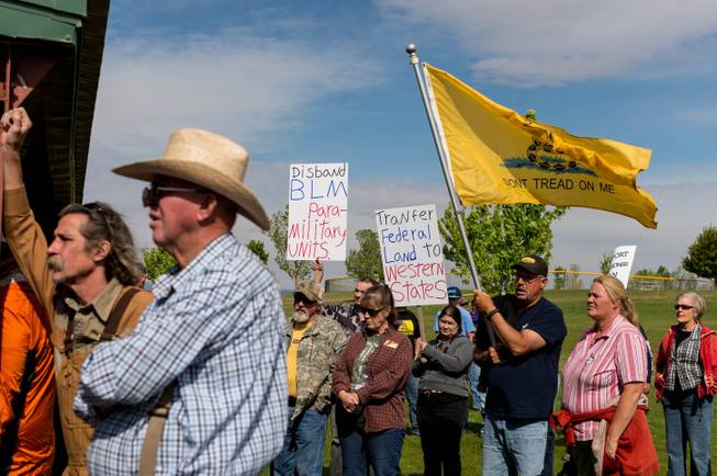 People listen to San Juan County Commissioner Phil Lyman at Centennial Park in Blanding, Utah on Saturday, May 10, 2014. Lyman organized an ATV protest ride into nearby Recapture Canyon to show that the federal agency isn't the "supreme authority" and local residents have a right to have their opinions heard. The area has been closed to motorized use since 2007 when an illegal trail was found that cuts through Ancestral Puebloan archaeological sites. The canyon is open to hikers and horseback riders.
