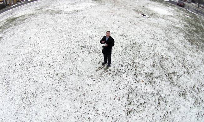 This December 2013 photo, taken by a camera mounted on a drone aircraft and provided by Pedro Rivera, shows Rivera in Hartford, Conn. Rivera filed a federal lawsuit Tuesday, Feb. 18, 2014, alleging that Hartford police officers violated his rights by demanding he stop using the aircraft to record images of an auto accident.