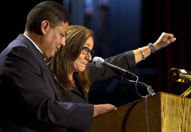 Rev. Bernardo Iniesta-Avila and Rev. Dr. Candace Lansberry brief the attendees as the Nevadans for the Common Good gather at the Cashman Center for their second community convention on Tuesday, May 13, 2014. He is with All Saints Episcopal Church and she is the north district superintendent, desert southwest conference, of the United Methodist Church.