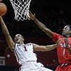 Rutgers guard Jerome Seagears, left, shoots in front of SMU guard Ryan Manuel, right, during the second half of an NCAA college basketball game on Friday, Feb. 14, 2014, in Piscataway, N.J. SMU won 77-65. Rutgers guard Jerome Seagears, left, shoots in front of SMU guard Ryan Manuel, right, during the second half of an NCAA college basketball game on Friday, Feb. 14, 2014, in Piscataway, N.J. SMU won 77-65.