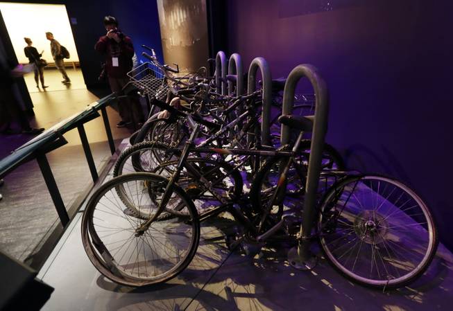 A salvaged bicycle rack, that was located on the northern edge of the World Trade Center site, is displayed at the National Sept. 11 Memorial Museum, Wednesday, May 14, 2014, in New York. The museum is a monument to how the Sept. 11 terror attacks shaped history, from its heart-wrenching artifacts to the underground space that houses them amid the remnants of the fallen twin towers' foundations. It also reflects the complexity of crafting a public understanding of the terrorist attacks and reconceiving ground zero. (AP Photo)