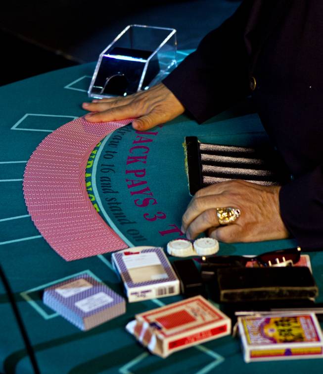 George Joseph shows some sleight-of-hand techniques during a Courtroom Conversation at the National Museum of Organized Crime and Law Enforcement on Wednesday, May 21, 2014. The MOB Museum is playing host for "Beating the Odds, An Inside Look at Casino Cheating" in its historic courtroom.