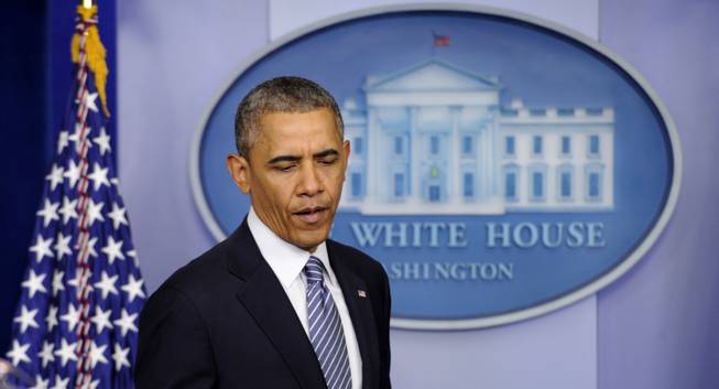 President Barack Obama arrives in the Brady Press Briefing Room of the White House in Washington, Friday, May 30, 2014, to make a statement following his meeting with Veterans Affairs Secretary Shinseki. The president said that Shinseki is resigning amid widespread troubles with veterans' health care.