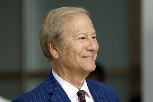 In this May 27, 2014, file photo, businessman Lewis Katz arrives for a closed-door auction to buy the the Philadelphia Inquirer and Philadelphia Daily News in Philadelphia. Philadelphia Inquirer co-owner Lewis Katz is among the seven people killed in a fiery plane crash in Massachusetts, the newspaper's editor said Sunday, June 1, 2014. Katz was 72.