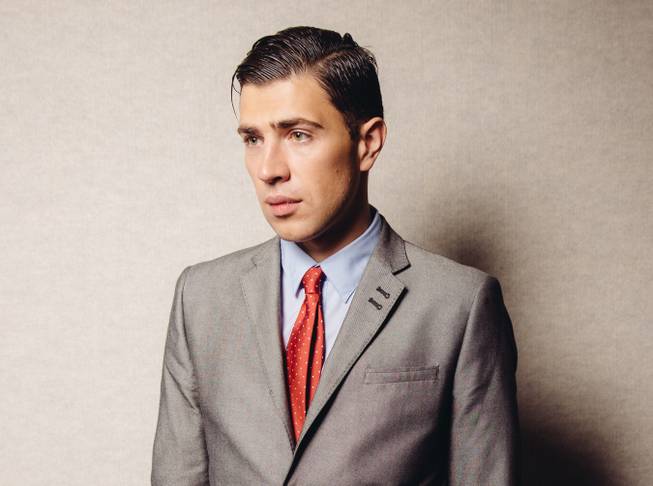 Vitalii Sediuk at the AP office Monday, June 2, 2014, in Los Angeles. Sediuk told AP in an interview Monday that he never intended to hurt actor Brad Pitt and was merely trying to give him a hug when he toppled over a barricade and jostled with him at the red carpet premiere of “Maleficent.”