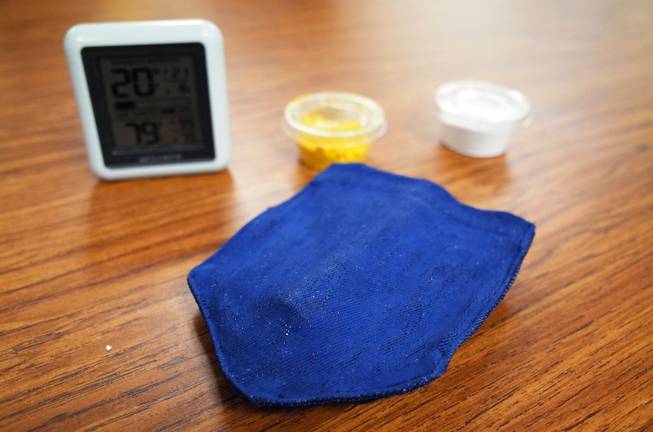 Hyde Park Middle School seventh graders Moulin Patel, 13; Ashish Kalakuntla, 12; Anik Patel, 12; and Vidhu Ramakrishnan, 12; created an invention that neutralizes pollen. The pocket patch, humidity sensor, pollen and a white titanium dioxide powder are shown here on Tuesday, June 10, 2014. The students will represent Nevada in the national eCybermission competition on June 20.
