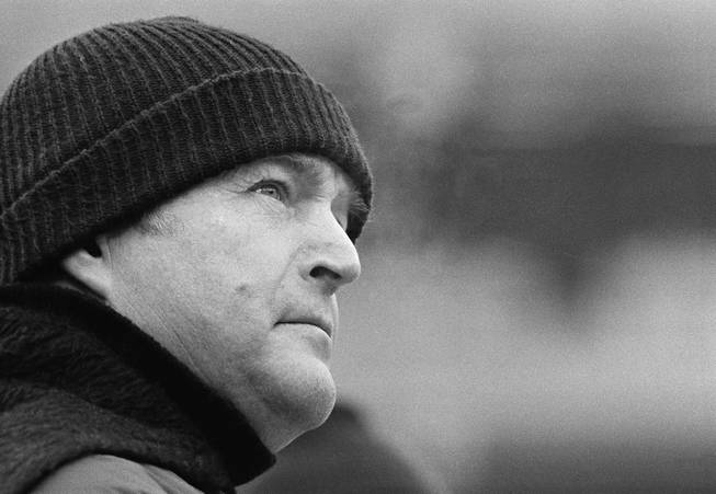 In this Jan. 6, 1980, file photo, Pittsburgh Steelers coach Chuck Noll glances toward the scoreboard clock during the closing seconds of AFC championship game against the Houston Oilers in Pittsburgh. Noll's Steelers beat Houston, 27-13, to earn a berth in the NFL football Super Bowl.