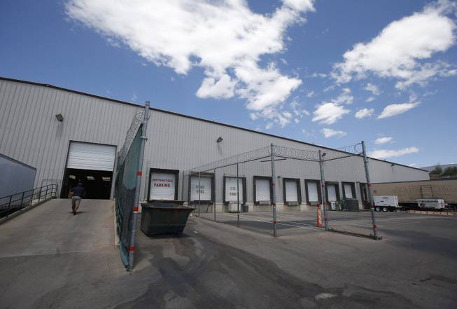 The outside of the U.S. Customs and Border Protection Nogales Placement Center where hundreds of mostly Central American immigrant children are being processed and held on Wednesday, June 18, 2014, in Nogales, Ariz. CPB provided media tours Wednesday of two locations in Brownsville, Texas, and Nogales, that have been central to processing the more than 47,000 unaccompanied children who have entered the country illegally since Oct. 1. (AP Photo/Ross D. Franklin, Pool)