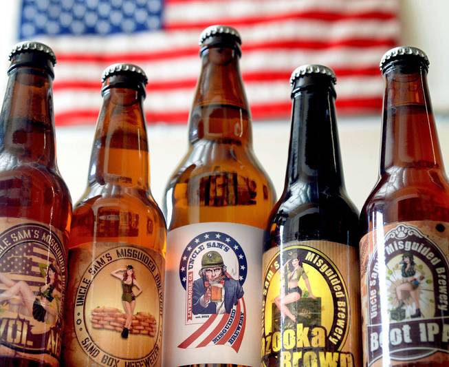Bottles of beer available at Uncle Sam's Misguided Brewery are photographed in Livermore, Calif., on Friday, May 30, 2014. With names like AWOL Pale Ale, Boot IPA and Bazooka Brown, it's clear Uncle Sam's Misguided Brewery is a twist on an age-old craft. The veteran-owned and operated microbrewery is not only employing veterans, but it's also putting a portion of its profits into developing nontraditional rehabilitation programs like yoga, wilderness adventures, equine therapy and transformational sailing.