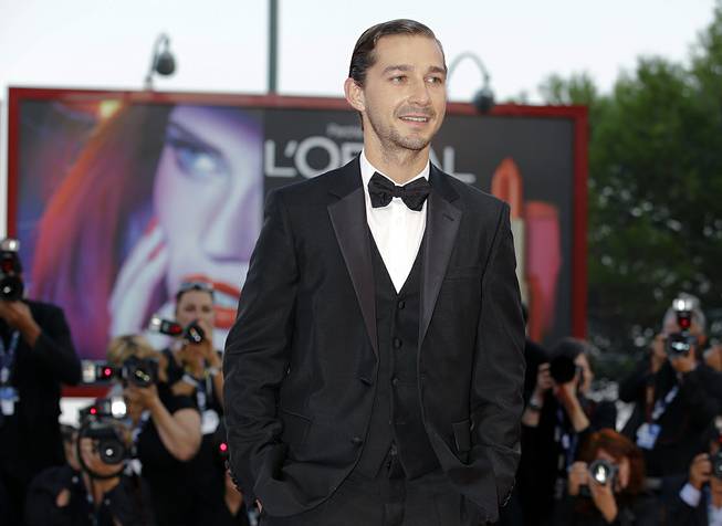Actor Shia LaBeouf arrives for the premiere of "The Company You Keep" at the Venice Film Festival in Venice, Italy, on Sept. 6, 2012. The New York Police Department confirmed Thursday, June 26, 2014, that LaBeouf was removed from a New York City theater for causing a disruption.