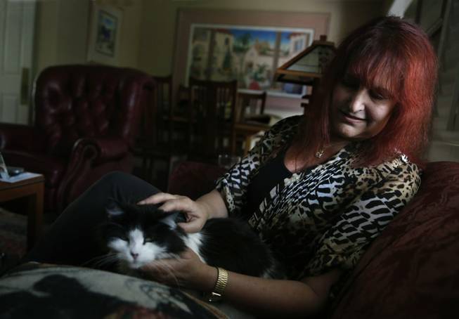 Jean Buchanan sits in her Fullerton, Calif., home on June 26, 2014. She survived breast cancer surgery and chemotherapy over the past 12 months, but she received conflicting information from hospital doctors on her Obamacare provider network and is now stuck with $9,000 in medical bills.