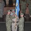 Photo: Rear Adm. Richard Butler hands the colors to Rear Photo: Rear Adm. Richard Butler hands the colors to Rear