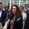Photo: Attorney Mari Newman, center, talks with members o Photo: Attorney Mari Newman, center, talks with members o
