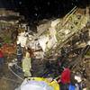 Photo: Rescue workers work next to the wreckage of TransA Photo: Rescue workers work next to the wreckage of TransA