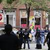 Photo: Police officers stand guard at the scene of a shoo Photo: Police officers stand guard at the scene of a shoo