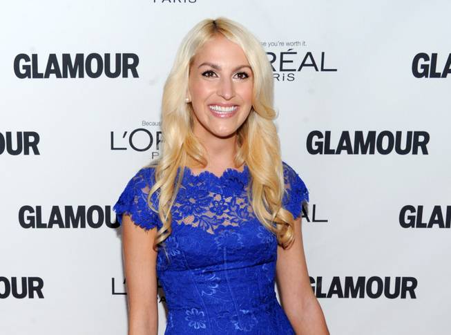 This Nov. 11, 2013, file photo shows honoree Kaitlin Roig-DeBellis attending the 23rd Annual Glamour Women of the Year Awards at Carnegie Hall in New York. Roig-DeBellis, a teacher at Sandy Hook Elementary School who helped save students' lives during a mass shooting, has a book deal. G.P. Putnam's Sons for "Choosing Hope: Moving Forward from Your Life's Darkest Hour." The book will be released in the spring of 2015.