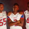 Photo: From left, Liberty High School football players J Photo: From left, Liberty High School football players J