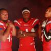 Photo: From left, Valley High School football players Ja Photo: From left, Valley High School football players Ja