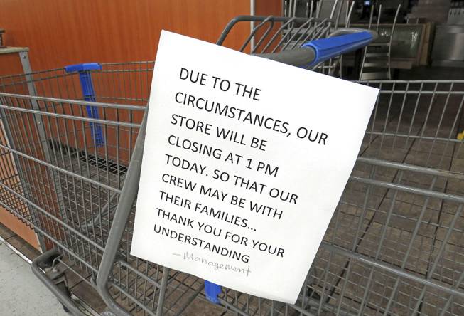 A sign inside the Walmart McDonalds restaurant alerts customers that it sent its employees home early in Kailua-Kona, Hawaii, Thursday, Aug. 7, 2014, as the area prepares for Hurricane Iselle. Hurricane Iselle is expected to arrive on the Big Island on Thursday evening, bringing heavy rains, winds gusting up to 85 mph and flooding in some areas. Weather officials changed their outlook on the system Wednesday after seeing it get a little stronger, giving it enough oomph to stay a hurricane as it reaches landfall.