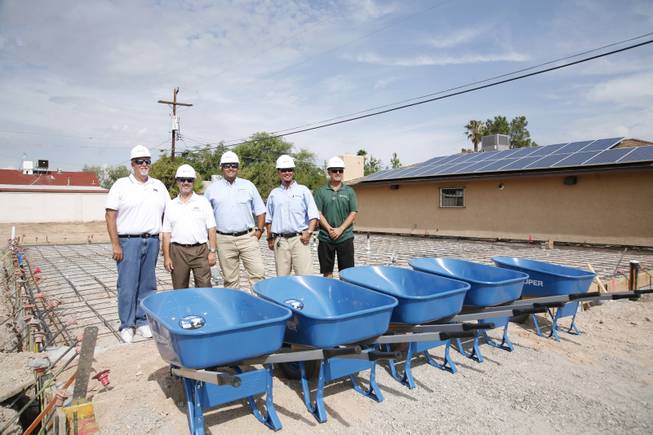 The Build Team for the Drop-In Center for Nevada Partnership for Homeless Youth includes (from left):
Kevin Cosgrove, Select build BMC; Nat Hodgson, Southern Nevada Home Builders Association; Carlos Zuluaga; Pardee Homes; Monty Fitzpatrick, Pardee Homes; and Shawn Arkenburg, Warmington Residential. The team came together through HomeAid Southern Nevada, an SNHBA-funded program builds new lives for area homeless through housing and community outreach.